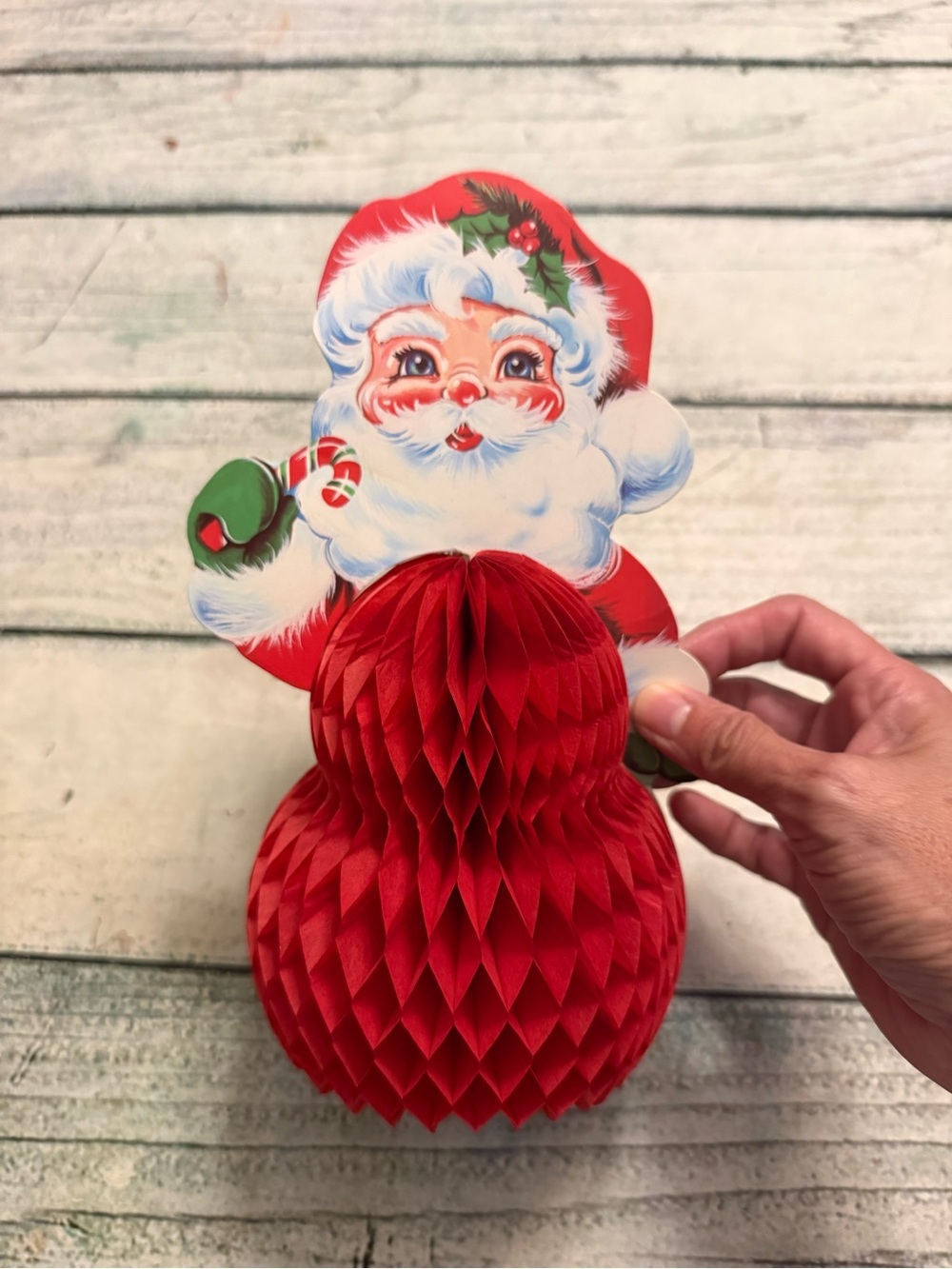 Vintage paper Santa Claus honeycomb centerpiece.